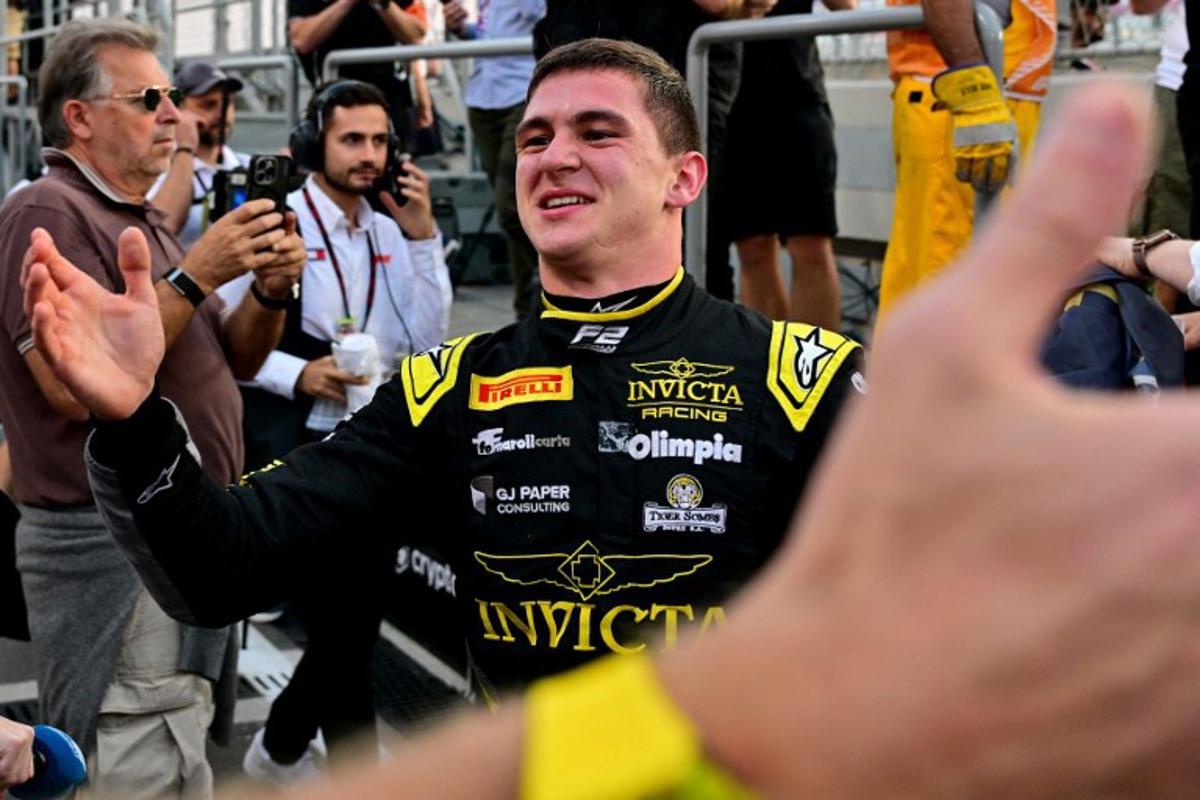 Invicta Racing's Italian driver Leonardo Fornaroli celebrates his Formula 2 title ahead of the Formula One Qatar Grand Prix at the Lusail International Circuit in Lusail on November 30, 2025.  Andrej ISAKOVIC / AFP