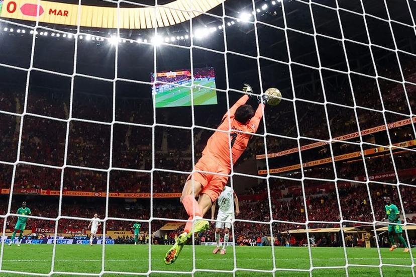 Morocco's goalkeeper #01 Yassine Bounou foils an attempt during the Africa Cup of Nations (CAN) final football match between Senegal and Morocco at the Prince Moulay Abdellah Stadium in Rabat on January 18, 2026.  FRANCK FIFE / AFP
