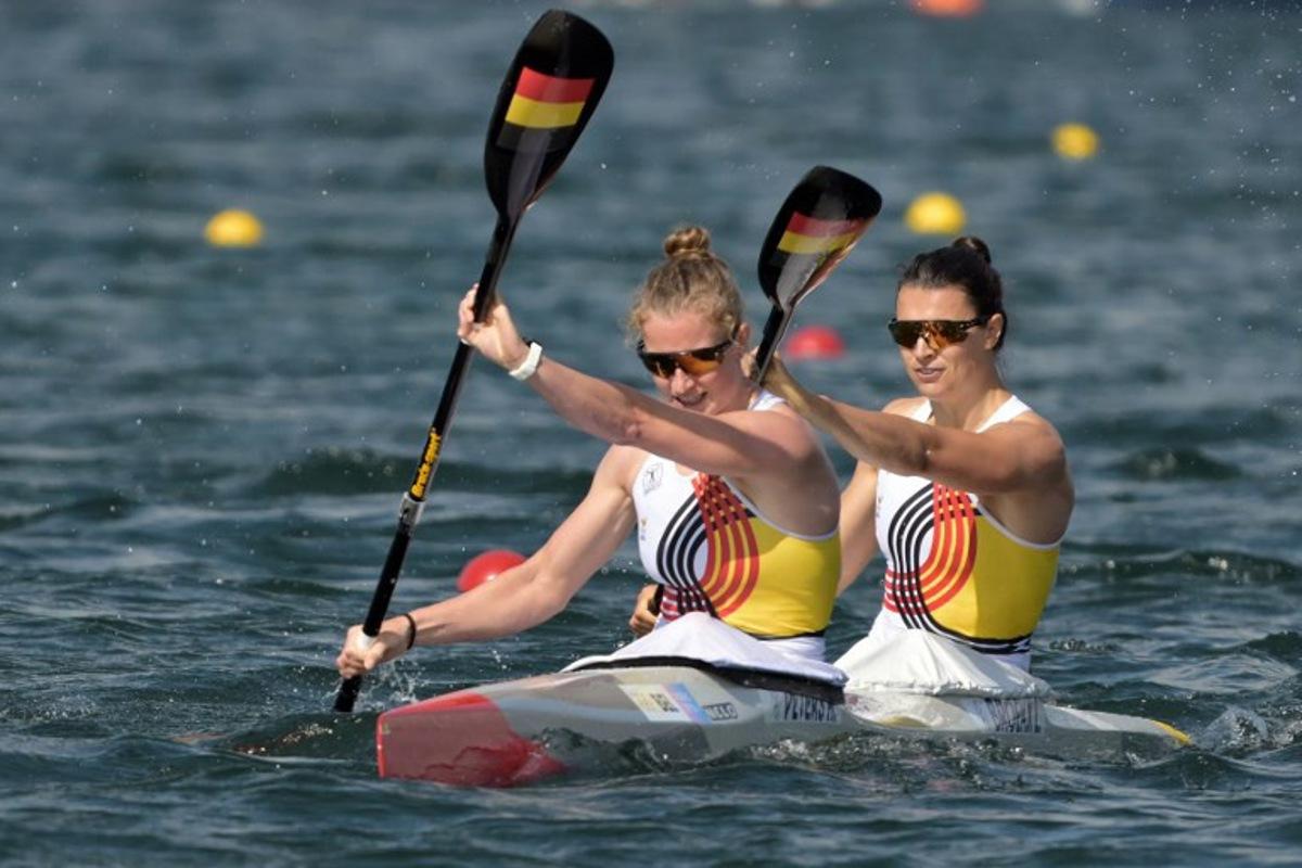 Belgium's Hermien Peters (L) and Belgium's Lize Broekx compete in the women's kayak double 500m semifinal of the canoe sprint competition at Vaires-sur-Marne Nautical Stadium in Vaires-sur-Marne during the Paris 2024 Olympic Games on August 9, 2024.  Bertrand GUAY / AFP