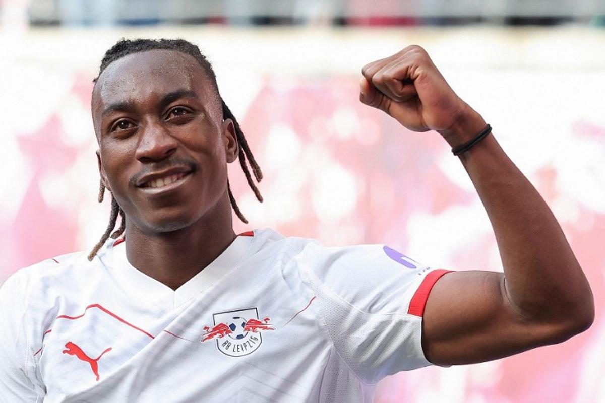 Leipzig's Ivorian forward #49 Yan Diomande celebrates scoring the opening goal during the German first division Bundesliga football match between RB Leipzig and Borussia Moenchengladbach in Leipzig, eastern Germany, on April 11, 2026.  Ronny HARTMANN / AFP