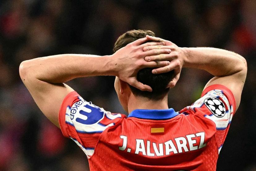Atletico Madrid's Argentine forward #19 Julian Alvarez reacts during the UEFA Champions League Round of 16 second leg football match between Club Atletico de Madrid and Real Madrid CF at the Metropolitano stadium in Madrid on March 12, 2025.  JAVIER SORIANO / AFP