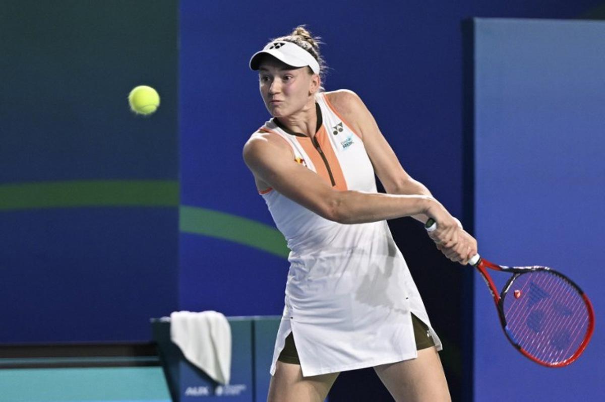 Kazakhstan's Elena Rybakina hits a return to Italy's Jasmine Paolini during their women's singles semi-final match at the WTA Ningbo Open tennis tournamen in Ningbo, in China's eastern Zhejiang province on October 18, 2025.  AFP