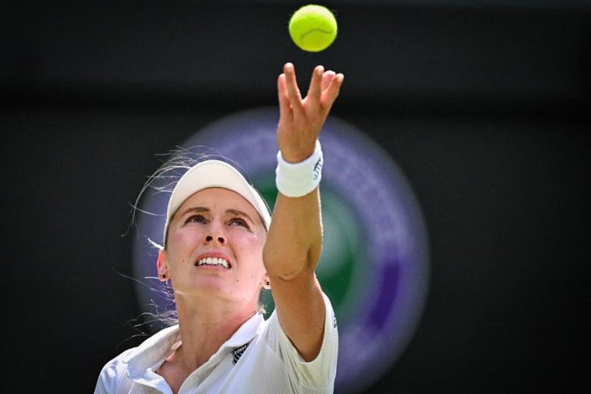 Russia's Ekaterina Alexandrova serves to Switzerland's Belinda Bencic during their women's singles fourth round tennis match on the eighth day of the 2025 Wimbledon Championships at The All England Lawn Tennis and Croquet Club in Wimbledon, southwest London, on July 7, 2025.  Kirill KUDRYAVTSEV / AFP