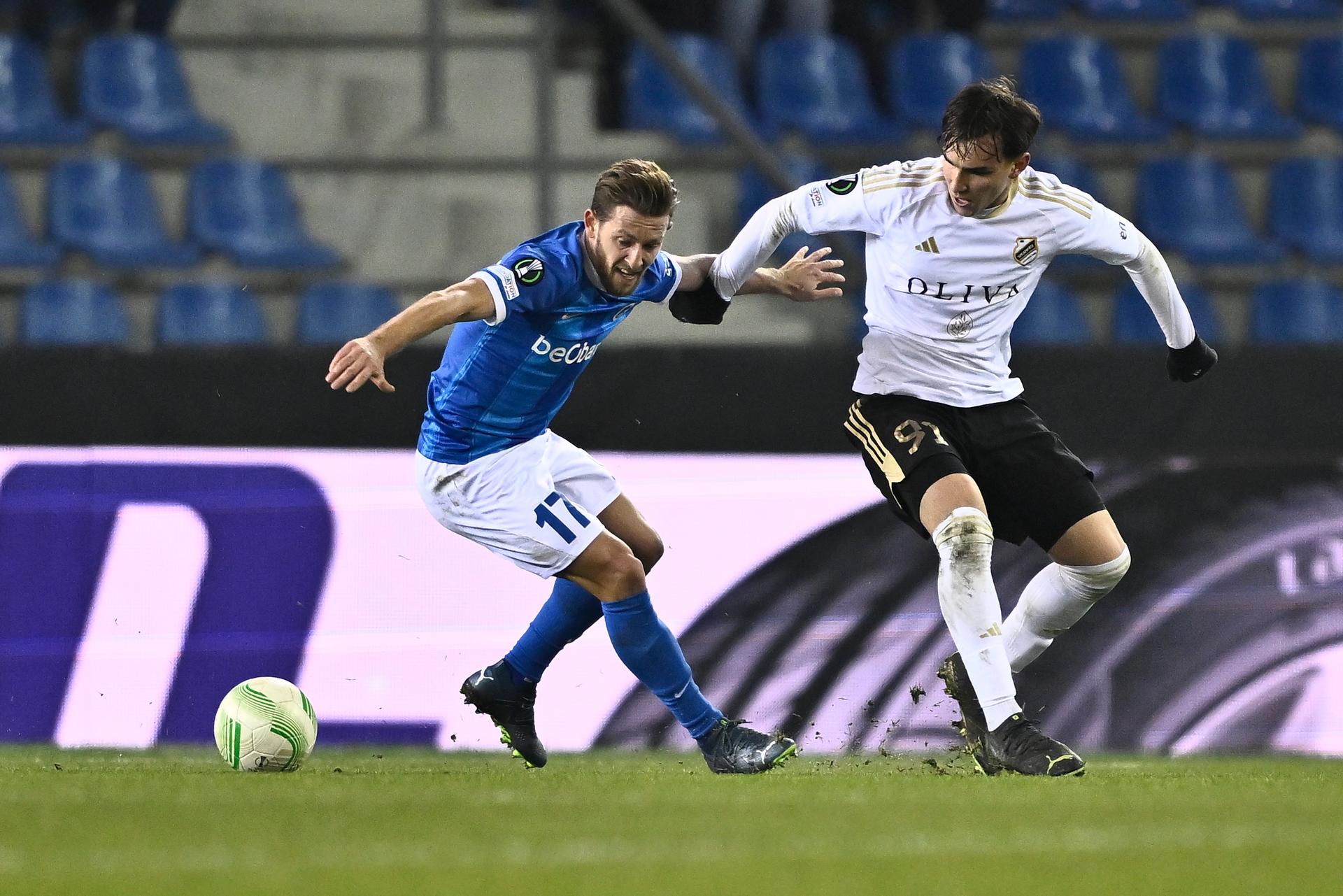 Genk's Patrik Hrosovsky and Cukaricki's Mihajlo Cvetkovic fight for the ball during a game between Belgian soccer team KRC Genk and Serbian club FK Cukaricki, on Thursday 14 December 2023 in Genk, for the sixth and last day of the group phase of the UEFA Conference League competition, in group F. BELGA PHOTO JOHAN EYCKENS