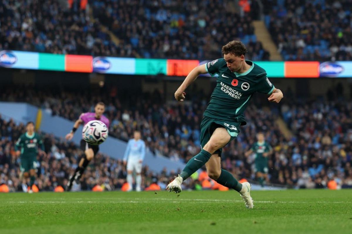 Brighton's Belgian defender #29 Maxim De Cuyper shoots but fails to score during the English Premier League football match between Manchester City and Brighton and Hove Albion at the Etihad Stadium in Manchester, north west England, on October 31, 2026.  Darren Staples / AFP