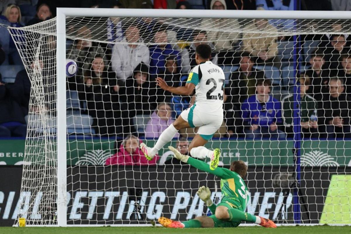 Newcastle United's English midfielder #23 Jacob Murphy scores their second goal during the English Premier League football match between Leicester City and Newcastle United at King Power Stadium in Leicester, central England on April 7, 2025.  Darren Staples / AFP