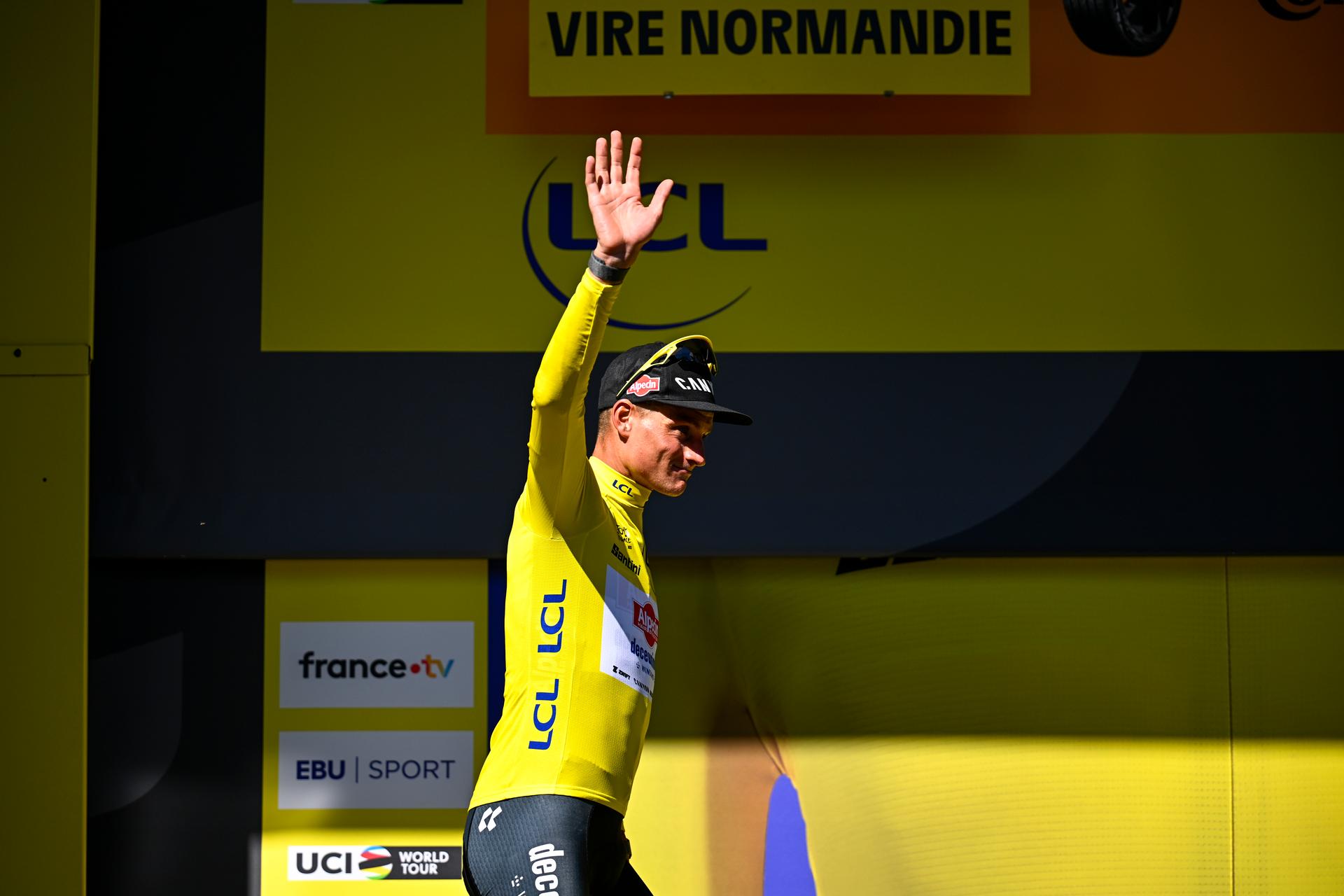 Dutch Mathieu van der Poel of Alpecin-Deceuninck celebrates on the podium in the yellow jersey of leader in the overall ranking after stage six of the 2025 Tour de France cycling, from Bayeux to Vire Normandie (201 km), on Thursday 10 July 2025 in France. The 112th edition of the Tour de France starts on Saturday 5 July in Lille, France, and will finish in Paris, France on the 27th of July. BELGA PHOTO JASPER JACOBS