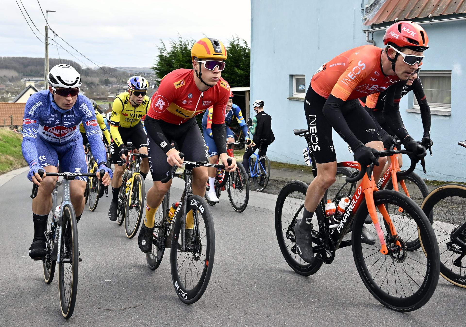 Belgian Jasper Philipsen of Alpecin-Deceuninck, Belgian Wout van Aert of Team Visma-Lease a Bike, Norwegian Stian Fredheim of Uno-X Mobility and Welsh Luke Rowe of Ineos Grenadiers pictured in action during the 79th edition of the men's one-day cycling race Omloop Het Nieuwsblad (UCI World Tour), 202km from Gent to Ninove, Saturday 24 February 2024. BELGA PHOTO DIRK WAEM