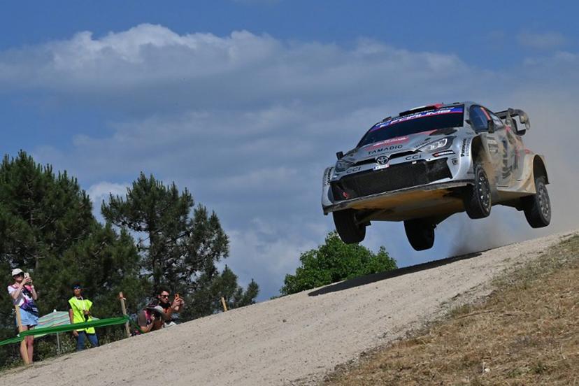 French driver Sebastien Ogier and French co-driver Vincent Landais steer their Toyota GR Yaris Rally 1, as they compete in the SS11 special at "Micky's Jump" between Monte Lerno and Su Filigosu during the 22nd edition of the Rally Italia Sardegna, 6th round of the FIA World Rally Championship (WRC), near Budusso, Sardinia, on June 7, 2025.  Andreas SOLARO / AFP