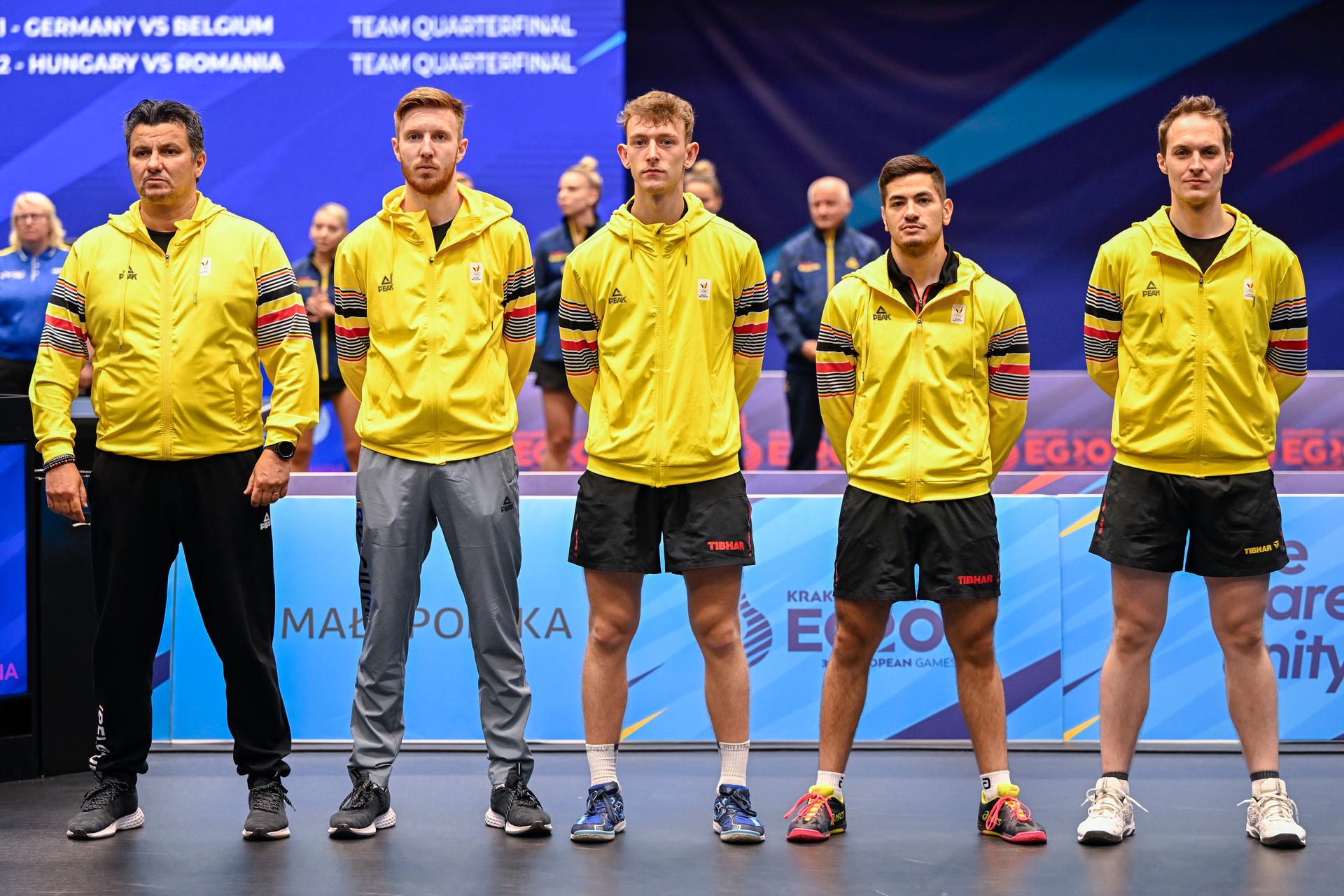 Table Tennis Coach Martin Bratanov, Belgian table tennis player Florian van Acker, Table Tennis player Adrien Rassenfosse, Table Tennis player Martin Allegro and Table Tennis player Cedric Nuytinck pictured at the start of a match in the Men's Team Quarterfinal between Belgium and Germany, in the Table Tennis competition at the European Games in Krakow, Poland on Thursday 29 June 2023. The 3rd European Games, informally known as Krakow-Malopolska 2023, is a scheduled international sporting event that will be held from 21 June to 02 July 2023 in Krakow and Malopolska, Poland. BELGA PHOTO LAURIE DIEFFEMBACQ