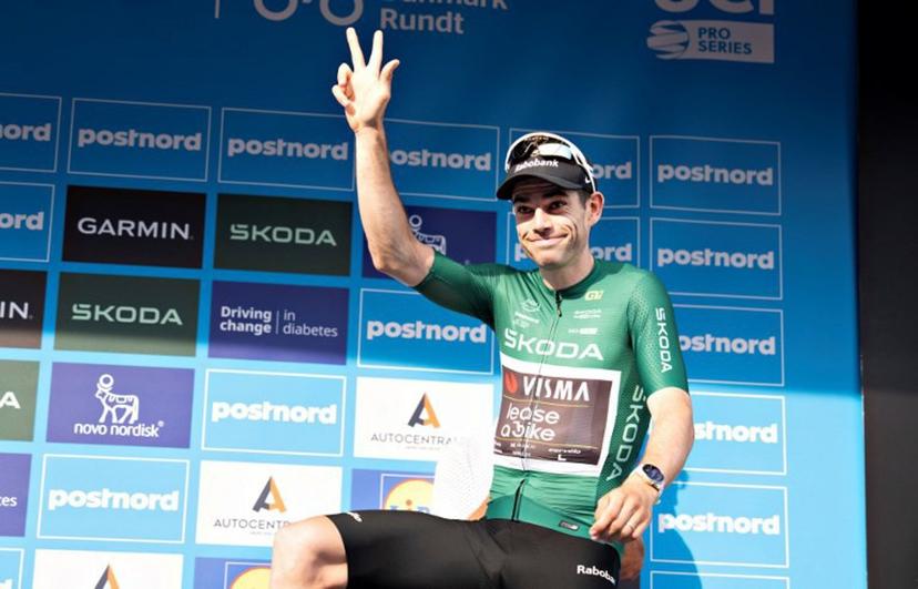 Team Visma | Lease a Bike's Belgian rider Wout Van Aert celebrates after being declared the winner of the 2. stage on the photo finish and wears green points jersey of the PostNord Denmark Tour on July 30, 2026 in Skive, Denmark.  The stage 2 is 187.2 kilometers long and runs from Glyngoere to Skive. Henning Bagger / Ritzau Scanpix / AFP