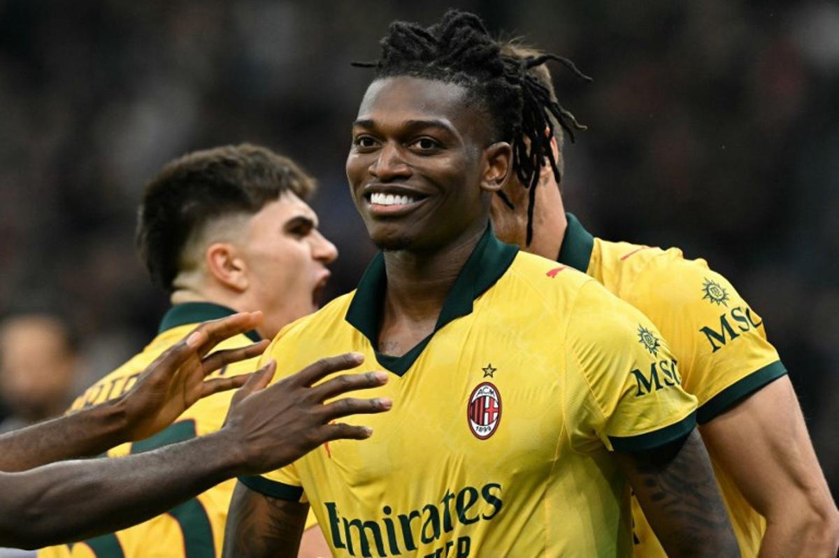 AC Milan's Portuguese forward #10 Rafael Leao celebrates scoring his team's second goal during the Italian Serie A football match between AC Milan and Fiorentina at San Siro stadium in Milan, northern Italy, on October 19, 2025.  Stefano RELLANDINI / AFP