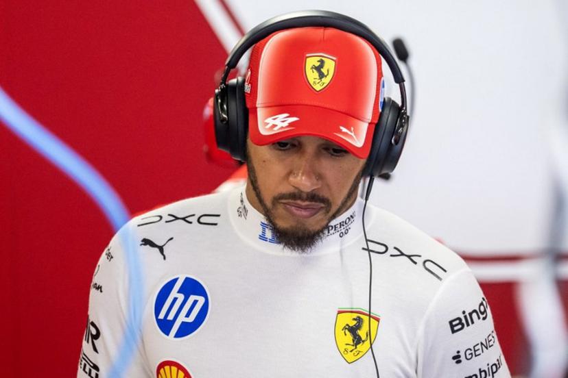 Ferrari's British driver Lewis Hamilton inspects his car during the first practice session at the Hungaroring racetrack in Mogyorod near Budapest, Hungary, on July 24, 2026 ahead of the Formula One Hungarian Grand Prix.  Andrej ISAKOVIC / AFP
