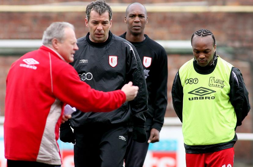 20060410 - LIEGE, BELGIUM : FROM L-R Coach Dominique D'Onofrio ( D ' Onofrio ) talks to Jorge Costa, Christian Negouai and Almani Da Silva Moreira during a training session of Standard soccer team, Monday 10 April 2006, in Liege, ahead of their Cup's half-final return match of Wednesday against Zulte-Waregem. BELGA PHOTO MICHEL KRAKOWSKI