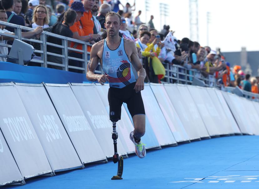 Belgian Wim De Paepe crosses the finish line at the Men Individual PTS2 triathlon event, on day 6 of the 2024 Summer Paralympic Games in Paris, France on Monday 02 September 2024. The 17th Paralympics are taking place from 28 August to 8 September 2024 in Paris. BELGA PHOTO VIRGINIE LEFOUR