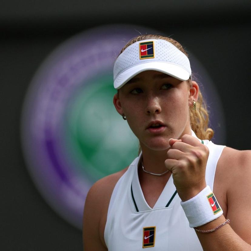 Russia's Mirra Andreeva reacts after winning her service game against Poland's Magda Linette  during their women's singles first round tennis match on the first day of the 2026 Wimbledon Championships at The All England Lawn Tennis and Croquet Club in Wimbledon, southwest London, on June 29, 2026.  Adrian Dennis / AFP