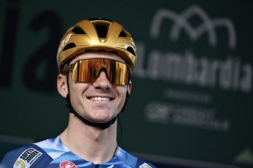 Soudal Quick-Step's Belgian rider Remco Evenepoel looks on from the sign-in podium ahead of the 119th edition of the Giro di Lombardia (Tour of Lombardy), a 238km cycling race from Como to Bergamo on October 11, 2025.  Marco BERTORELLO / AFP