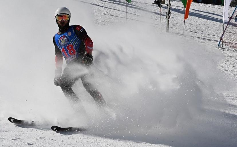 In this picture taken on January 29, 2019, Turkish skier Berkin Usta takes part in the CAS Karakoram International Alpine Ski Cup, at the Pakistan Air Force-owned and operated Naltar Ski Resort, some 25km north of Gilgit in Pakistan's remote mountainous north. Dozens of skiers in late January took part in a rare international competition in Pakistan, which boasts some of the world's highest mountains but remains off-piste for most winter sportsmen due to years of insecurity and lack of infrastructure. The Naltar Ski Resort in the Karakoram mountain range where the competition took place is at the heart of Pakistan's attempts to build up its winter sports tourism industry. AAMIR QURESHI / AFP