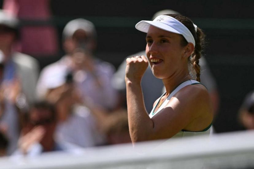 Belgium's Elise Mertens celebrates winning against Kazakhstan's Elena Rybakina during their women's singles third round tennis match on the sixth day of the 2026 Wimbledon Championships at The All England Lawn Tennis and Croquet Club in Wimbledon, southwest London, on July 4, 2026.  Glyn KIRK / AFP