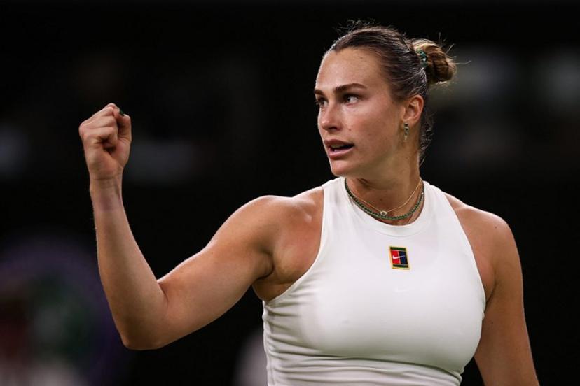 Belarus's Aryna Sabalenka celebrates after winning against Britain's Emma Raducanu during their women's singles third round tennis match on the fifth day of the 2025 Wimbledon Championships at The All England Lawn Tennis and Croquet Club in Wimbledon, southwest London, on July 4, 2025.  HENRY NICHOLLS / AFP