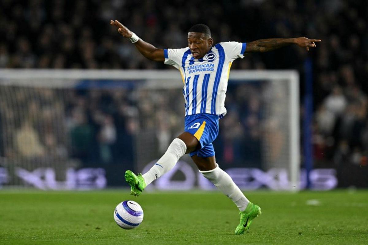 Brighton's Ecuadorian defender #30 Pervis Estupinan attempts to control the ball during the English Premier League football match between Brighton and Hove Albion and Aston Villa at the American Express Community Stadium in Brighton, southern England on April 2, 2025.  Glyn KIRK / AFP
