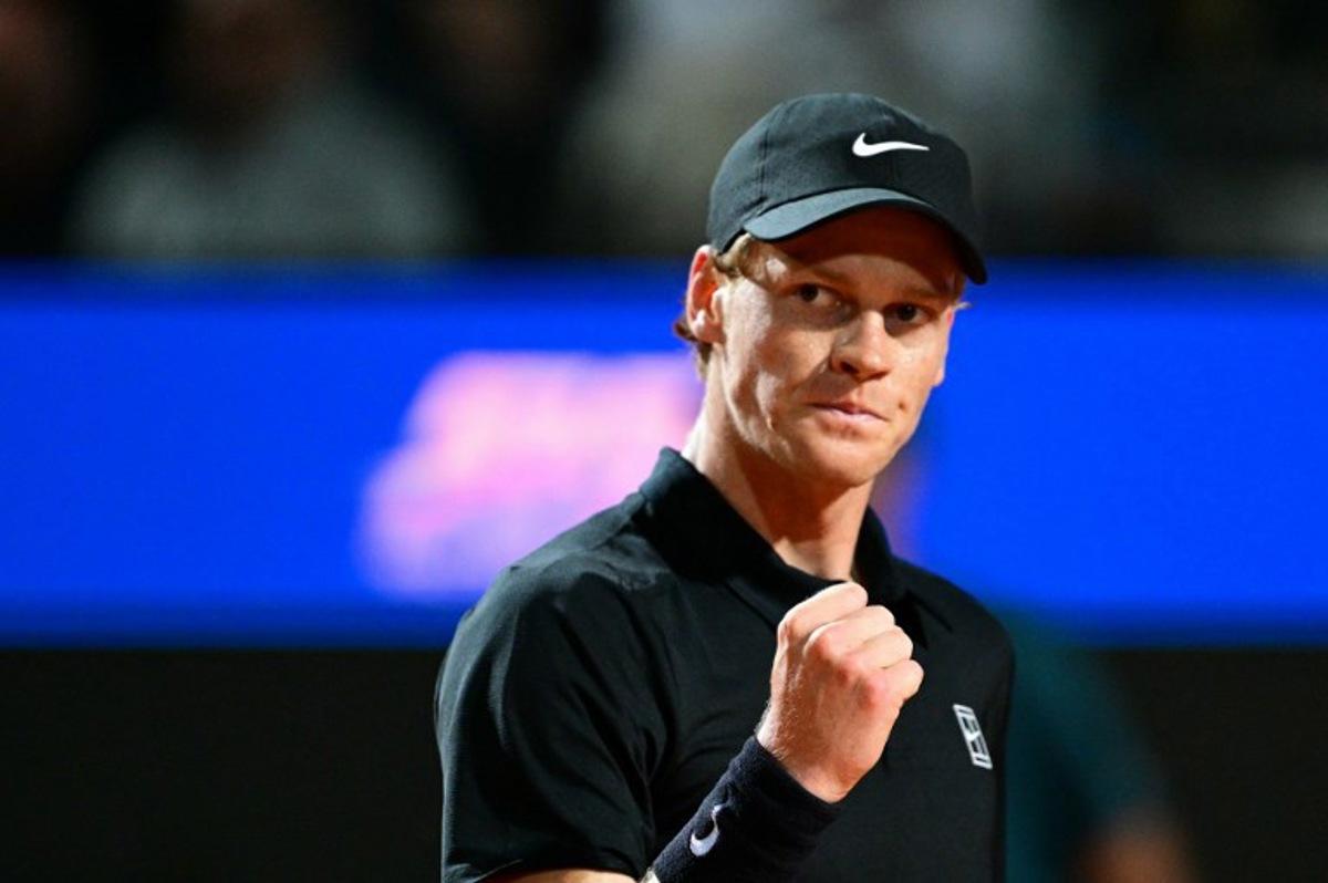 Italy's Jannik Sinner reacts during his men's singles semi-final match against USA's Tommy Paul for the ATP Rome Open tennis tournament at Foro Italico in Rome on May 16, 2025.   Tiziana FABI / AFP