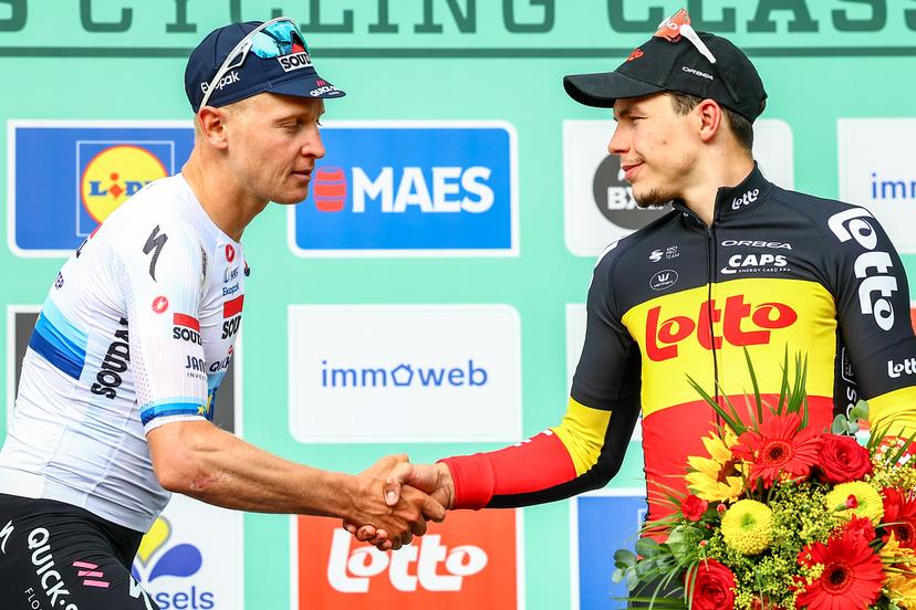 Belgian Tim Merlier of Soudal Quick-Step and Belgian Arnaud De Lie of Lotto Cycling Team pictured on the podium after the Brussels Cycling Classic one day cycling race, 205,1 km from and to Brussels, Sunday 08 June 2025. BELGA PHOTO DAVID PINTENS