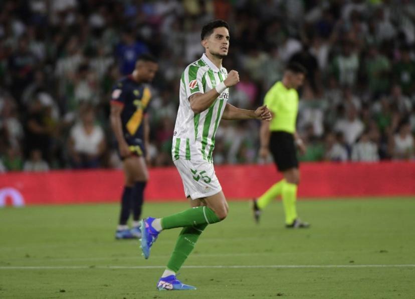 Real Betis' Spanish defender #05 Marc Bartra celebrates scoring his team's first goal during the Spanish league football match between Real Betis and Girona FC at the Benito Villamarin stadium in Seville on August 15, 2024.  CRISTINA QUICLER / AFP