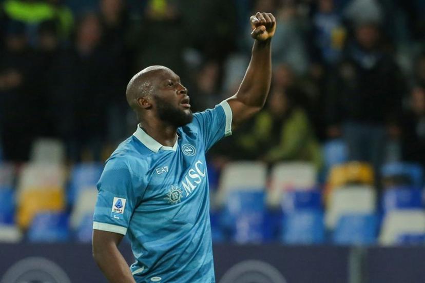 Napoli's Belgian forward #11 Romelu Lukaku celebrates after scoring during the Italian Serie A football match between Napoli and Empoli FC at the Diego Armando Maradona Stadium in Naples on April 14, 2025. Napoli's Uruguayan defender #17 Mathias Olivera fights for the ball with Empoli's Italian forward #99 Sebastiano Esposito  CARLO HERMANN / AFP