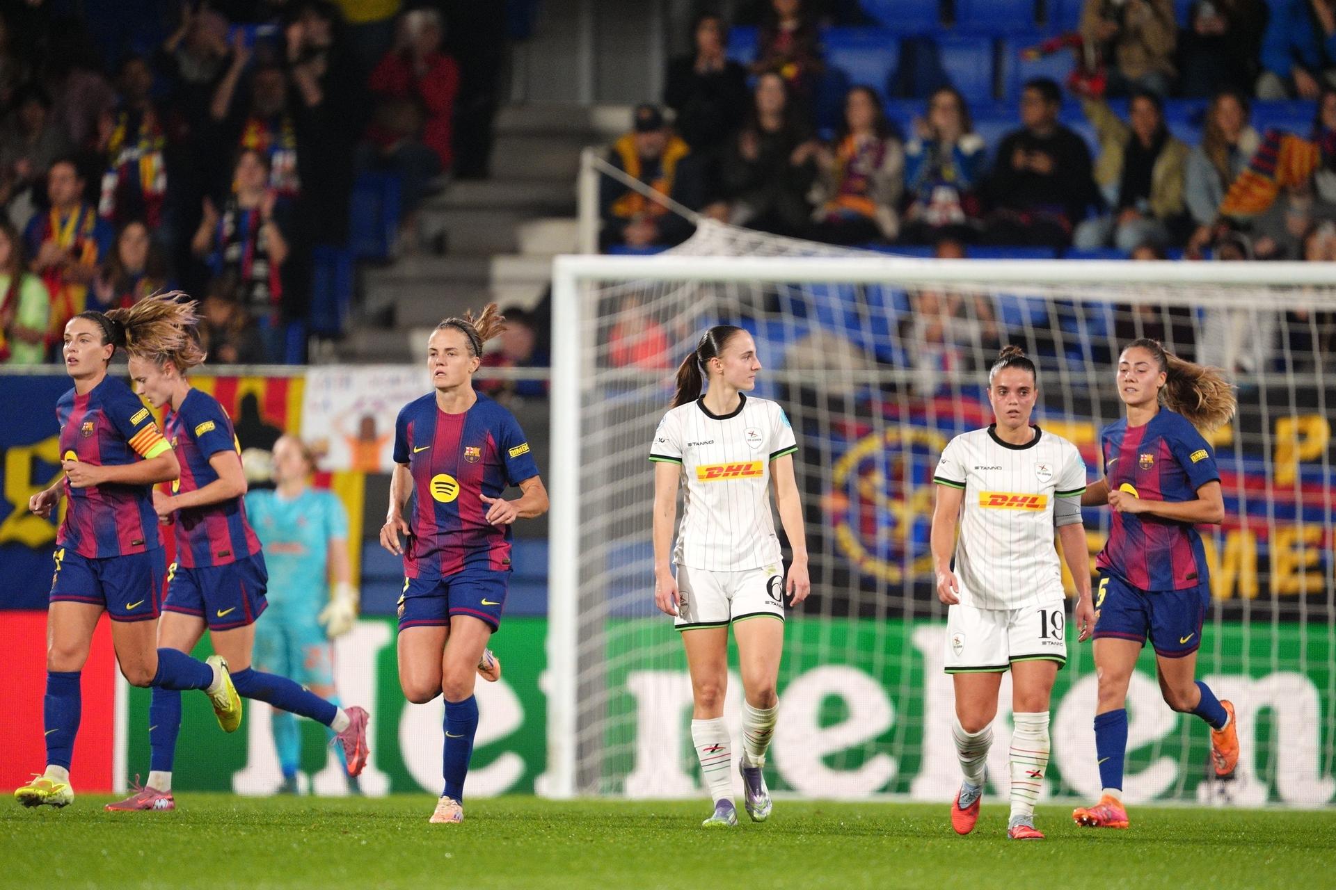 OHL's players look dejected during a soccer match between Spanish FC Barcelona Femeni and Oud-Heverlee Leuven Women, Wednesday 12 November 2025 in Barcelona, Spain, the third game in the league phase of the UEFA Women's Champions League competition.  BELGA PHOTO JOMA GARCIA I GISBERT