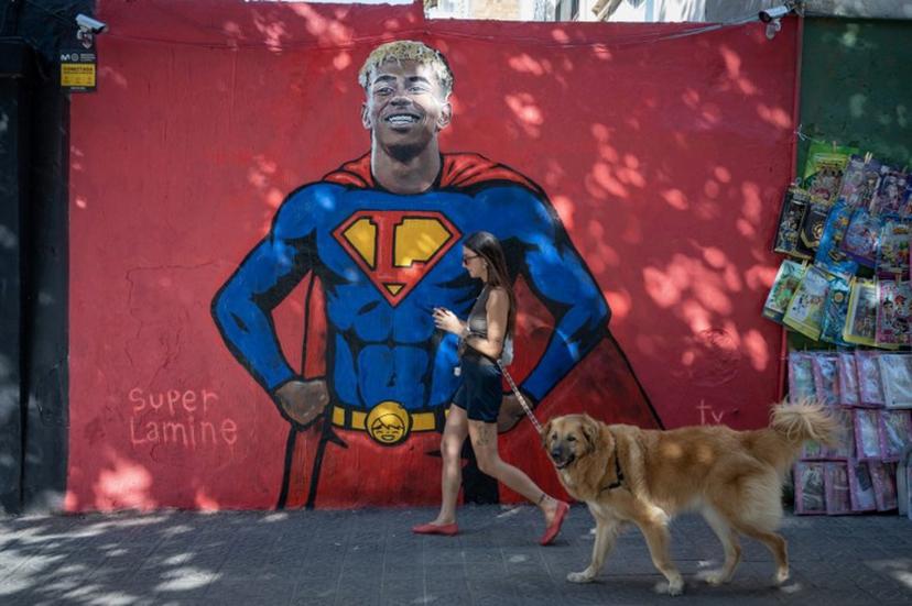 A graffiti by urban artist TV Boy depicts Barcelona's player Lamine Yamal in a superman costume in Barcelona on July 15, 2025 Barcelona star Lamine Yamal is facing an investigation regarding the presence of a group of people with dwarfism as entertainers at his 18th birthday party last weekend, Spain's Ministry of Social Rights told AFP Tuesday. The winger celebrated with a private event in Olivella, around 50 kilometres west of Barcelona, which the ministry asked the prosecutor's office to probe, following a complaint from the Association for People with Achondroplasia and Other Skeletal Dysplasias with Dwarfism (ADEE). Josep LAGO / AFP