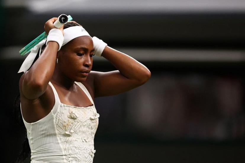 US player Coco Gauff reacts as she plays against Ukraine's Dayana Yastremska during their women's singles first round tennis match on the second day of the 2025 Wimbledon Championships at The All England Lawn Tennis and Croquet Club in Wimbledon, southwest London, on July 1, 2025.  HENRY NICHOLLS / AFP