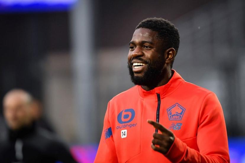 Lille's French defender #14 Samuel Umtiti smiles during the warm up ahead of the French L1 football match between Clermont Foot 63 and Lille LOSC at the Gabriel-Montpied stadium in Clermont-Ferrand, central France, on December 10, 2023.  ARNAUD FINISTRE / AFP