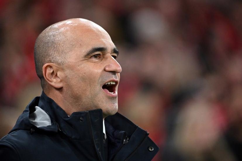 Portugal's Spanish head coach Roberto Martinez reacts during the UEFA Nations League quarter-final, first-leg football match Denmark v Portugal at the Parken Stadium in Copenhagen on March 20, 2025.   Jonathan NACKSTRAND / AFP