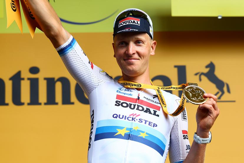 Belgian Tim Merlier of Soudal Quick-Step celebrates on the podium after winning the third stage of the 2025 Tour de France cycling, from Valenciennes to Dunkerque (178 km) on Monday 07 July 2025 in France. The 112th edition of the Tour de France starts on Saturday 5 July in Lille, France, and will finish in Paris, France on the 27th of July. BELGA PHOTO DAVID PINTENS