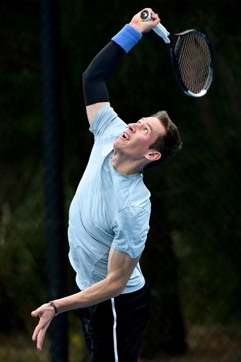 Belgium's Kimmer Coppejans serves during a practice session ahead of the United Cup tennis tournament in Sydney on January 2, 2026.  Saeed KHAN / AFP