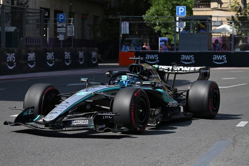 Mercedes' British driver George Russell steers his car during the first practice session ahead of the Formula One Azerbaijan Grand Prix at the Baku City Circuit in Baku on September 24, 2026.  Igor IVANKO / AFP