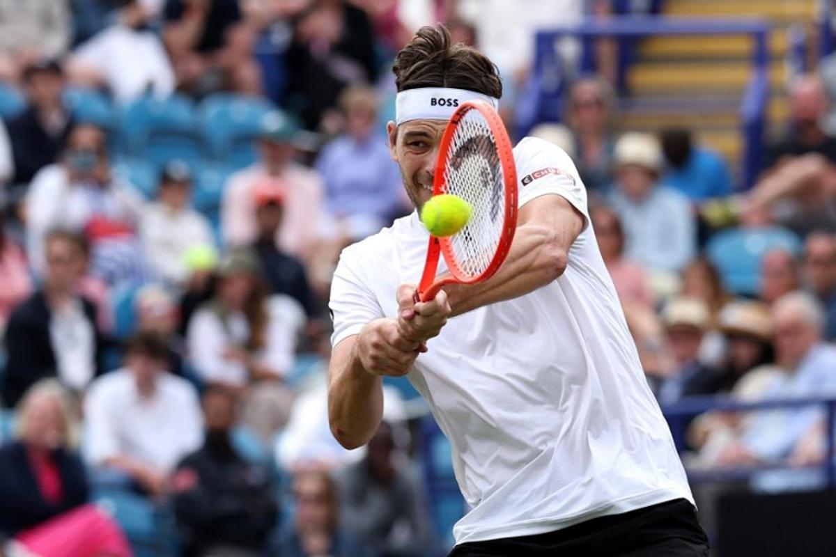 US player Taylor Fritz returns against US player Jenson Brooksby during their men's singles final tennis match on day six at the Lexus Eastbourne International tennis tournament in Eastbourne, southern England, on June 28, 2025.  Adrian Dennis / AFP