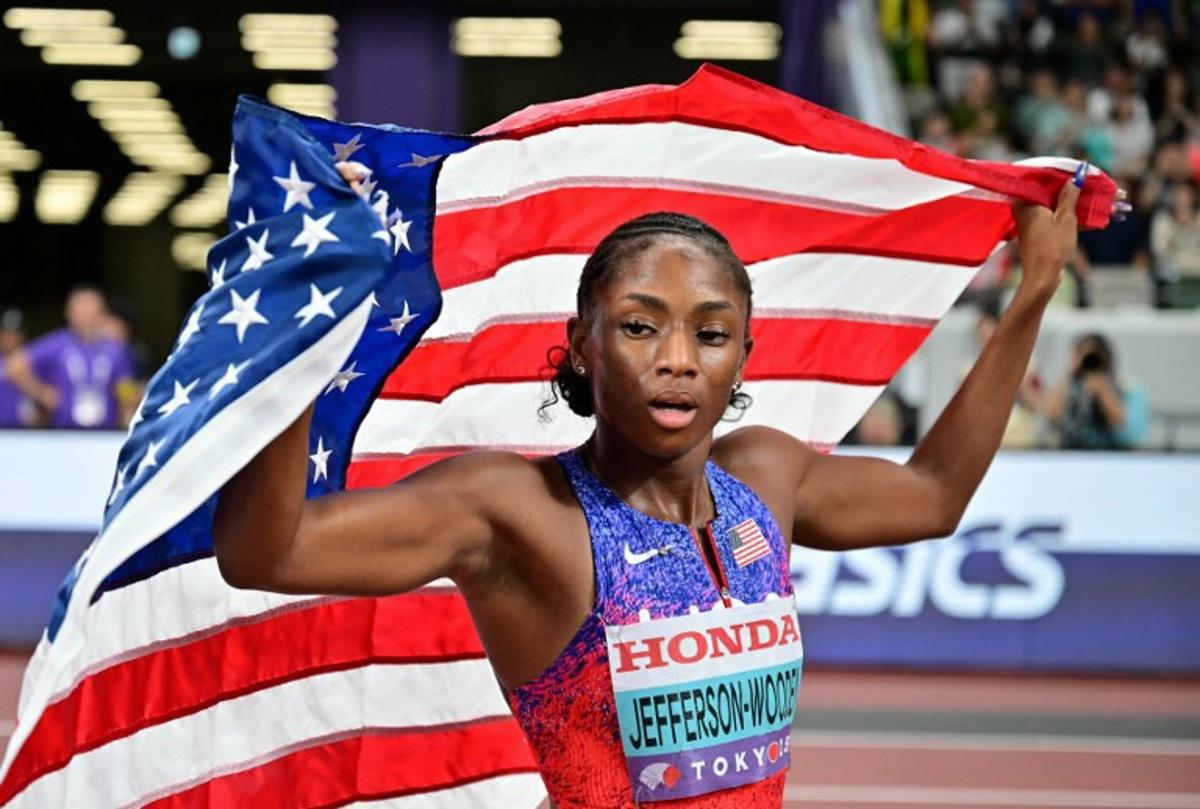 US' athlete Melissa Jefferson-Wooden celebrates winning the women's 100m final during the World Athletics Championships in Tokyo on September 14, 2025.  Ben STANSALL / AFP