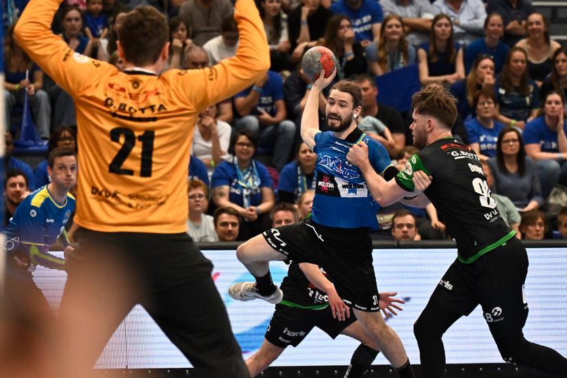 Bocholt's Pieter Strauven and Hubo Hasselt's Vio Bosca fight for the ball during a handball game between Hubo handbal Hasselt and Achilles Bocholt, Saturday 19 April 2025, in Hasselt, the men's final of the Belgian handball cup. BELGA PHOTO JOHAN EYCKENS
