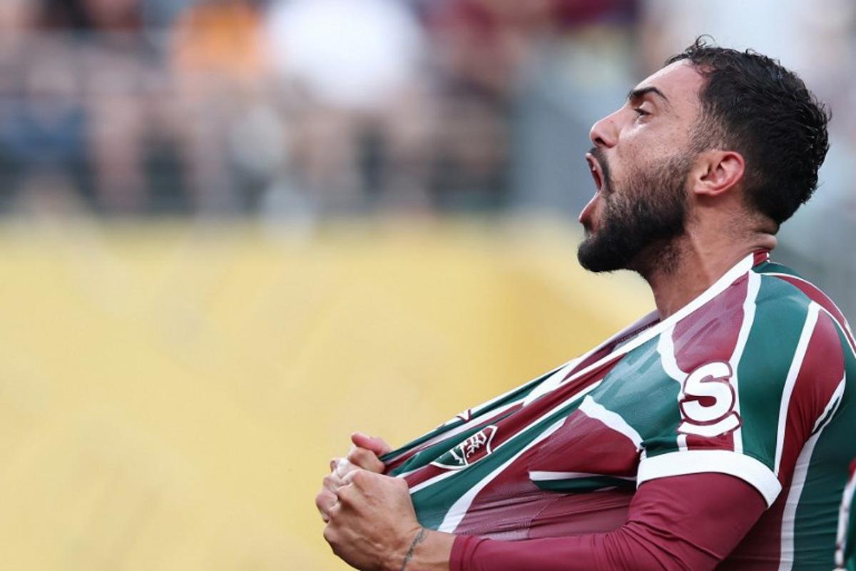 Fluminense's Argentine defender #22 Juan Pablo Freytes celebrates after scoring his team's third goal during the FIFA Club World Cup 2025 Group F football match between Brazil's Fluminense and South Korea's Ulsan HD at the MetLife stadium in East Rutherford, New Jersey on June 21, 2025.  FRANCK FIFE / AFP