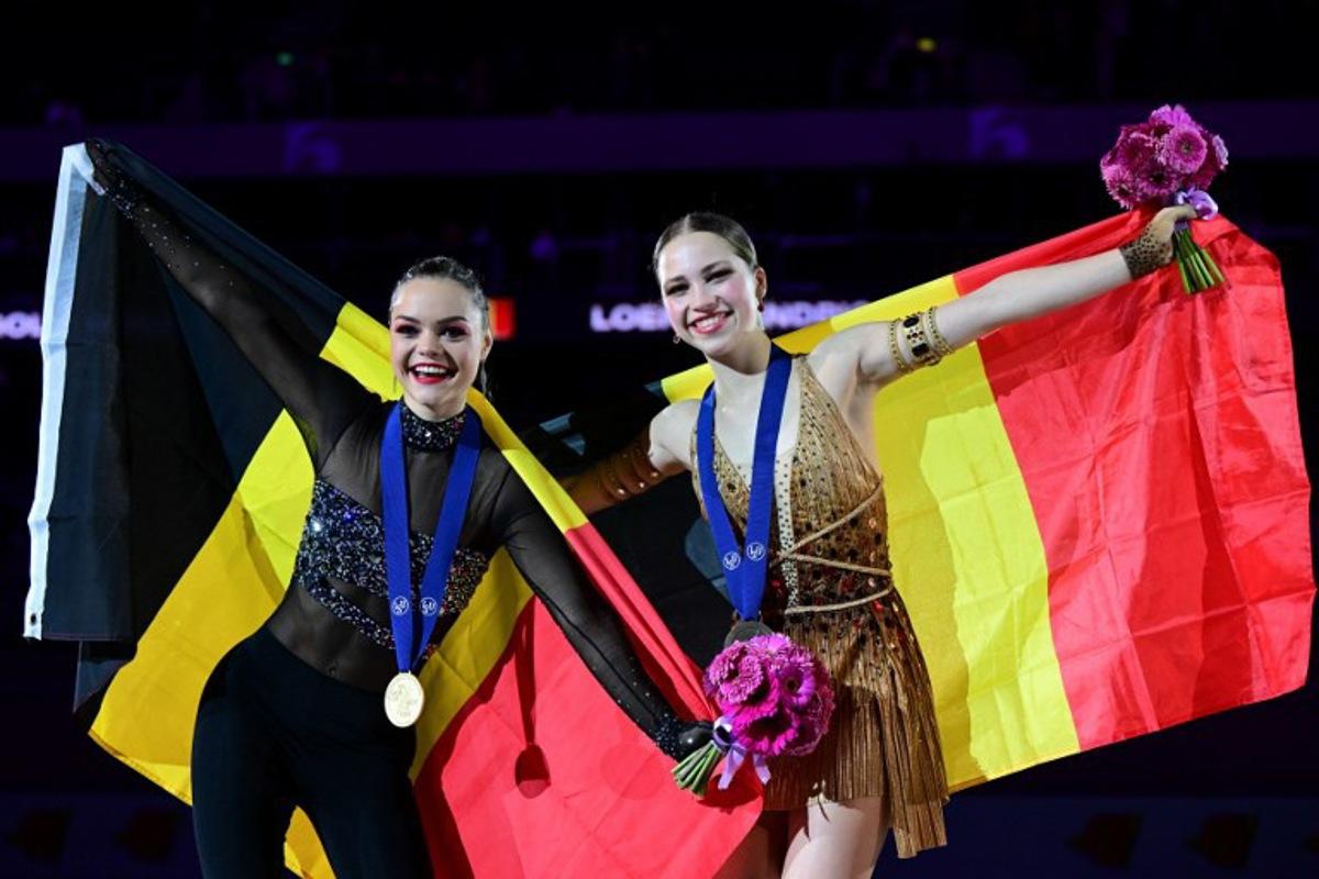 (LtoR) Winner Belgium's Loena Hendrickx and third placed Belgium's Nina Pinzarrone pose with their medals and Belgium's national flag after the women's free skating program of the ISU European Figure Skating Championship 2024 in the Zalgiris Arena in Kaunas, Lithuania, on January 13, 2024.  Daniel MIHAILESCU / AFP