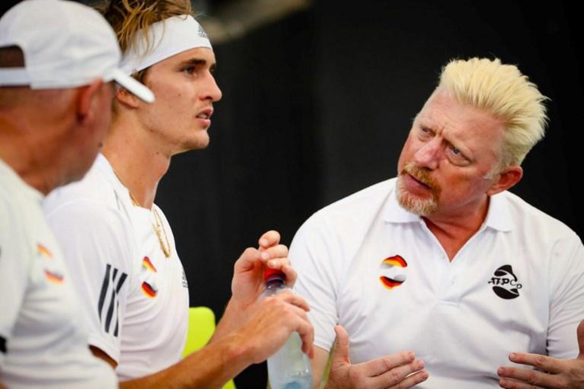 Alexander Zverev of Germany (2nd L) speaks with team captain Boris Becker (R) during the men's singles match on day five against Denis Shapovalov of Canada at the ATP Cup tennis tournament in Brisbane on January 7, 2020.  Patrick HAMILTON / AFP -- IMAGE RESTRICTED TO EDITORIAL USE - STRICTLY NO COMMERCIAL USE --

