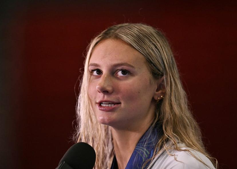 Canada's swimmer Summer McIntosh speaks to the press after the swimming event during the 2025 World Aquatics Championships in Singapore on August 3, 2025.  Oli SCARFF / AFP