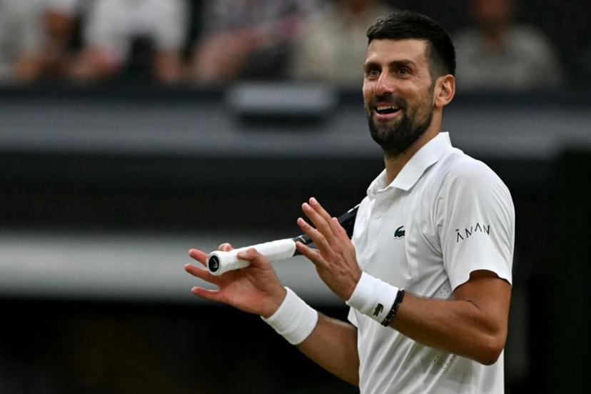 Serbia's Novak Djokovic reacts against Canada's Felix Auger-Aliassime during their men's singles quarter-final tennis match on the ninth day of the 2026 Wimbledon Championships at The All England Lawn Tennis and Croquet Club in Wimbledon, southwest London, on July 7, 2026.  Glyn KIRK / AFP