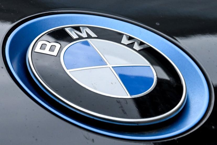 A logo of German automotive brand BMW is pictured on BMW car in Frankfurt am Main, western Germany, on May 5, 2026.  The BMW will announce its first-quarter financial report on May 6, 2026. Kirill KUDRYAVTSEV / AFP