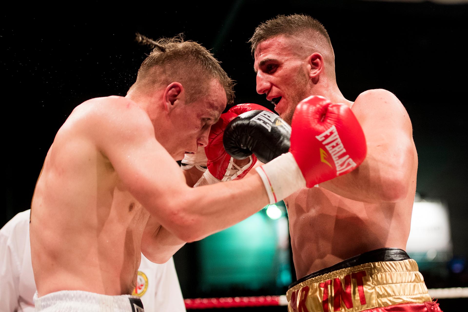 Belgian Jean-Pierre Bauwens Junior and Meriton Karaxha pictured in action during the fight between Belgian Jean-Pierre 'Junior' Bauwens and Belgian Meriton Karaxha, the super lightweight fight at the Gent Boksgala boxing event, on Friday 29 April 2016, in Ghent. BELGA PHOTO JASPER JACOBS