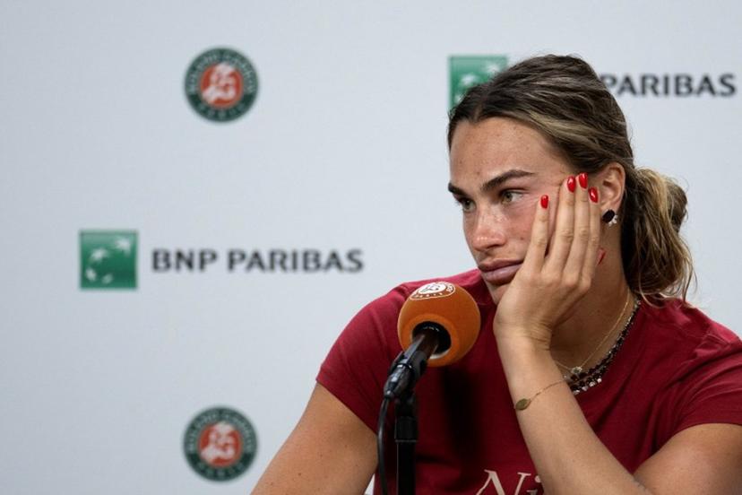 Aryna Sabalenka reacts during a press conference after being defeated by Diana Shnaider during their women's quarter final singles match on day 11 of the French Open tennis tournament on Court Philippe-Chatrier at the Roland-Garros Complex in Paris on June 3, 2026.  Sébastien DUPUY / AFP