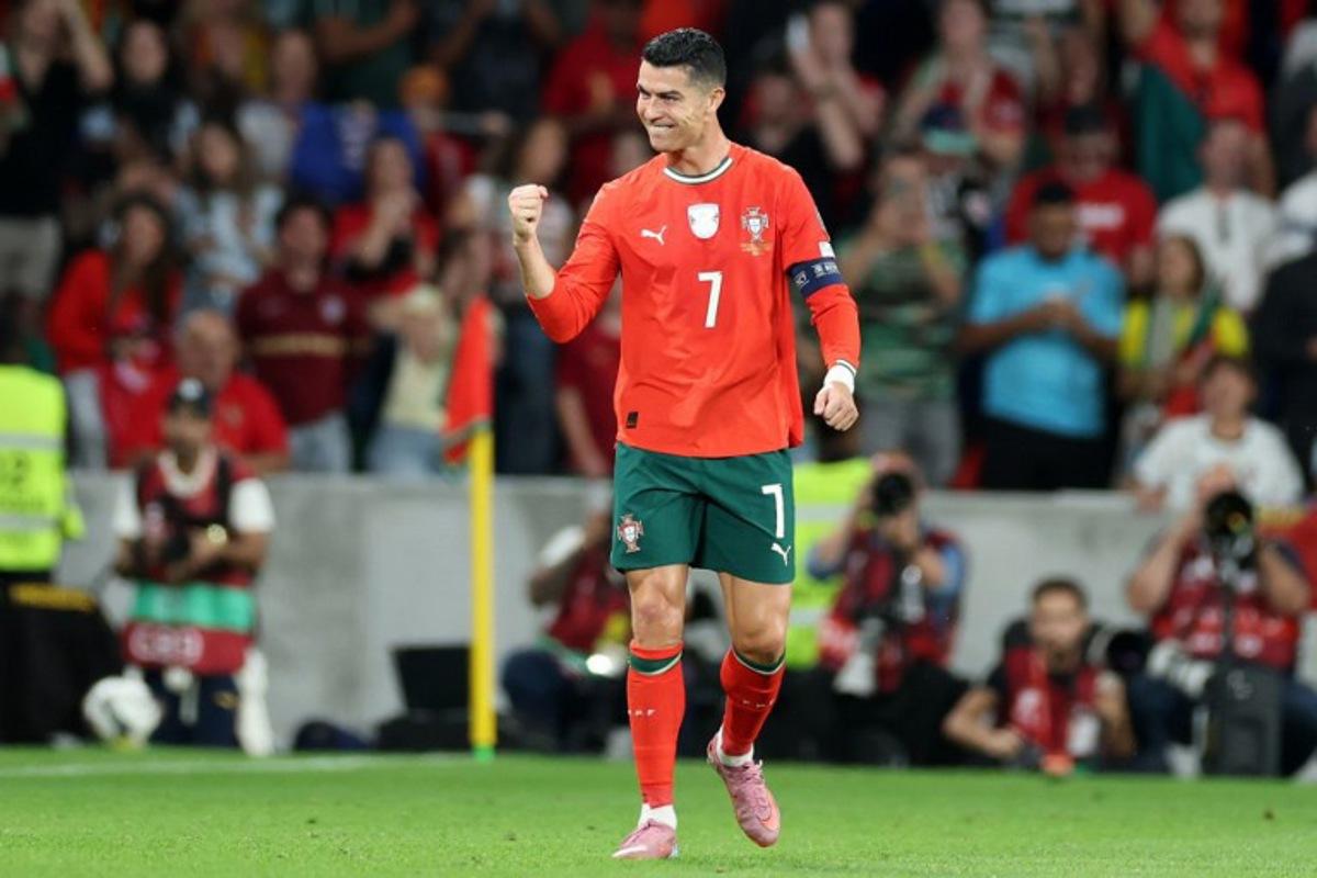 Portugal's forward #07 Cristiano Ronaldo celebrates scoring his team's second goal during the 2026 World Cup qualifiers Europe zone group F football match between Portugal and Hungary at Jose Alvalade stadium in Lisbon on October 14, 2025.  PATRICIA DE MELO MOREIRA / AFP