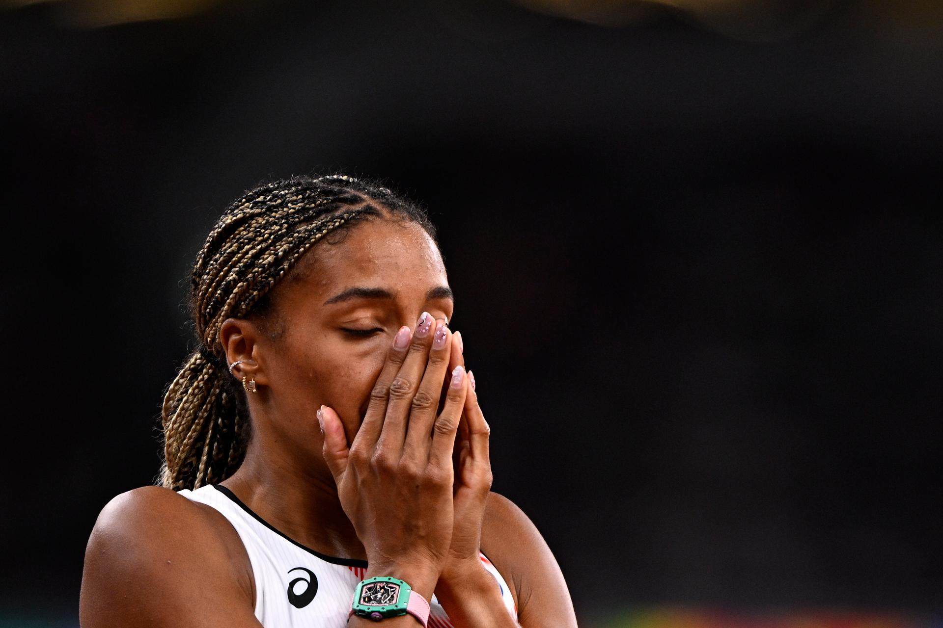 Belgian Nafissatou Nafi Thiam reacts with deception after the 200m race of the women's Heptathlon competition, at the World Athletics Championships in Tokyo, Japan, on Friday 19 September 2025. The outdoor Worlds are taking place from 13 to 21 September. BELGA PHOTO JASPER JACOBS